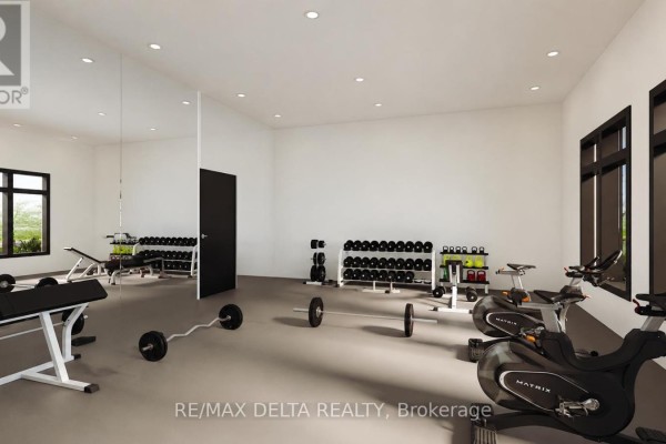 Gym with free weights, benches, and cardio machines against white walls. - 108 - 632 Laurier Street, Clarence Rockland