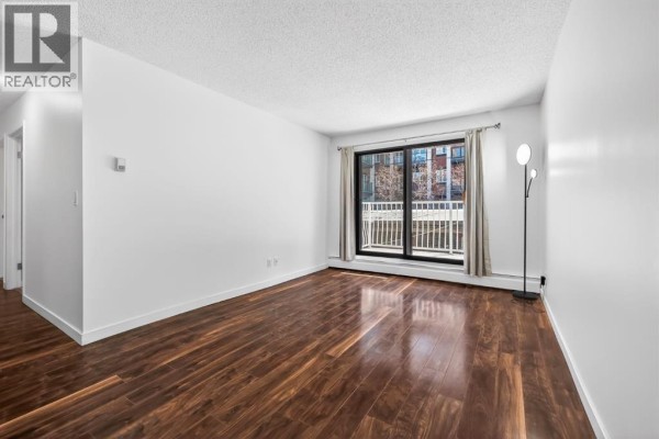 Primary Bedroom - 109, 835 19 Avenue Sw, Calgary, AB T2T0H6 Photo 3