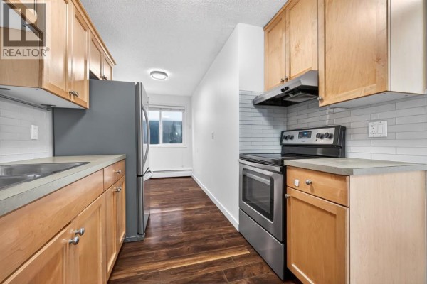 Dining room - 109, 835 19 Avenue Sw, Calgary, AB T2T0H6 Photo 5