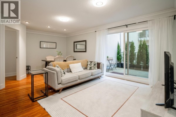 Bedroom corner with a desk and window, showcasing natural light - 109 815 Fourth Avenue, New Westminster