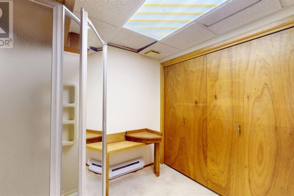 Shower, corner vanity, and wood closet doors - 109 Greenview Ln Sault Ste Marie