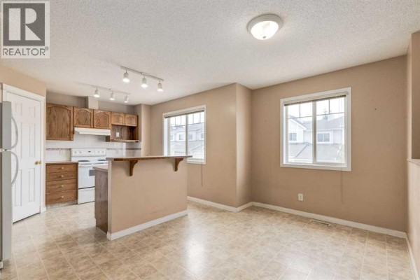 Dining room - 109 Hidden Creek Gardens Nw, Calgary, AB T3A6J4 Photo 3