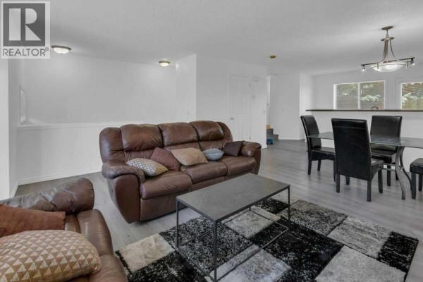 Living room - 109 Tuscany Springs Gardens Nw, Calgary, AB T3L2R4 Photo 4