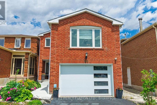 Red brick house with a white garage door and modern windows, under a cloudy sky. - 109 Woodcroft Lane, Vaughan