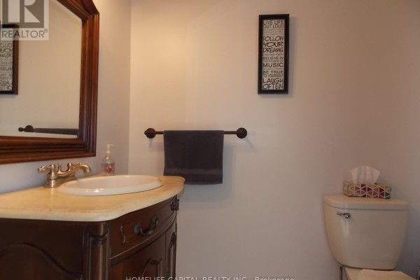 Dining room with hardwood floors, wooden table, and built-in bar - 1091 County Rd 15 Road, Alfred And Plantagenet