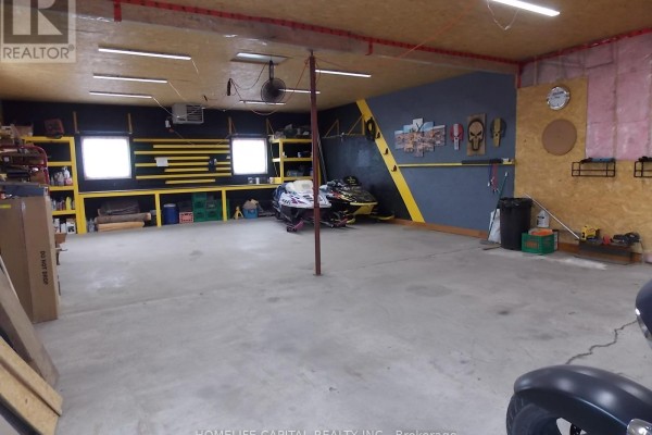 White house with two-car garage, black garage doors - 1091 County Rd 15 Road, Alfred And Plantagenet
