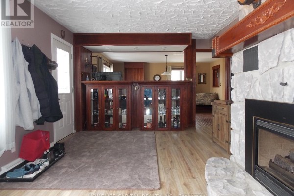 Bathroom with vanity, mirror, tub, and wood paneling - 1091 County Rd 15 Road, Alfred And Plantagenet