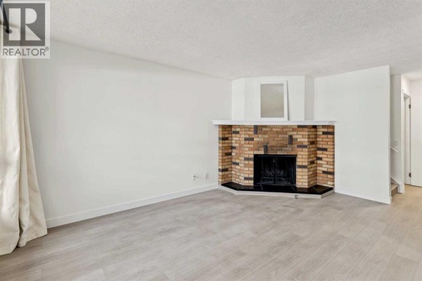 Family room - 11, 5315 53 Avenue Nw, Calgary, AB T3A2E7 Photo 5