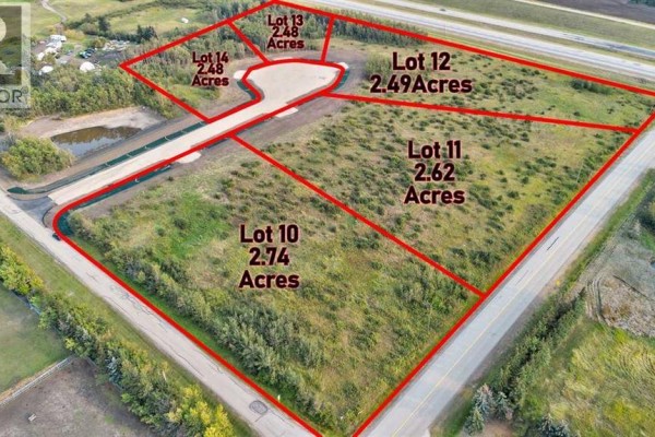 Aerial view showing multiple subdivided lots outlined in red with acreage noted. - 11, 701413 Range Road 72, Rural Grande Prairie No  1, County Of