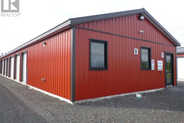 Another empty storage unit with metal walls and concrete floor - 11 Omahony Drive, Clarenville