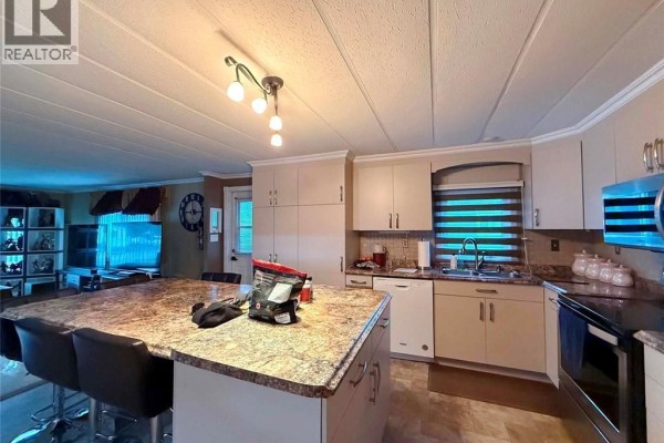 Kitchen/Dining room - 11 Parc P'tiso Street, Edmundston, NB E3V3X7 Photo 4