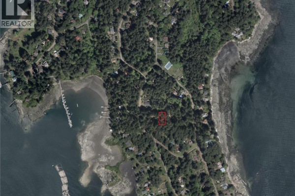 Aerial satellite view of Protection Island showing the wooded property outlined in red, near the water. - 11 Pirate Pl, Protection Island