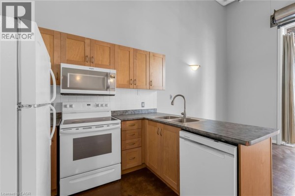 Living room - 11 Rebecca Street Unit# 405, Hamilton, ON L8R3H7 Photo 2