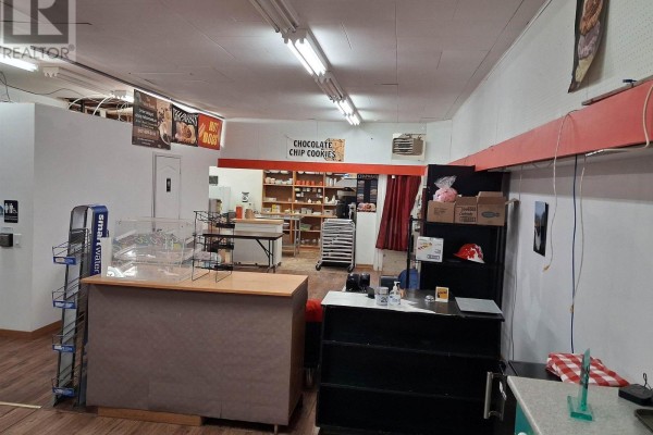 Commercial space with counters, shelving, and display cases. - 11 Simcoe Plaza, Terrace Bay