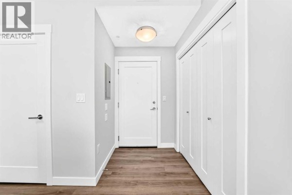 Living room - 110, 25 Walgrove Walk Se, Calgary, AB T2X5E2 Photo 5