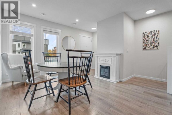 Living room - 110, 338 Seton Circle Se, Calgary, AB T3M3H1 Photo 4