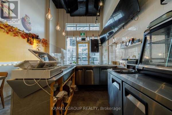 Interior view featuring pendant lights and autumn-themed decor - 110 - 28 Finch Avenue W, Toronto