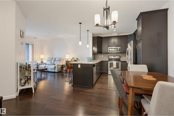 Kitchen - #110 6083 Maynard Wy Nw, Edmonton, AB T6R0S5 Photo 3