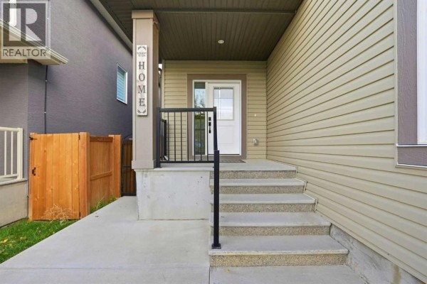 Den - 110 Baysprings Gardens Sw, Airdrie, AB T4B5C5 Photo 2