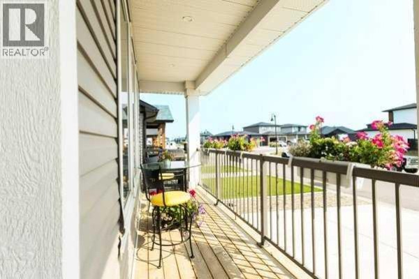 Living room - 110 Prairie Gold Street, Taber, AB T1G0G3 Photo 3