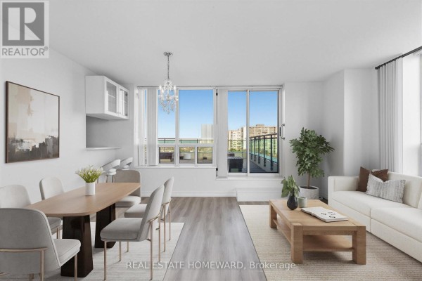 Living space with window, chandelier, and adjacent room access - 1102 - 2800 Warden Avenue, Toronto