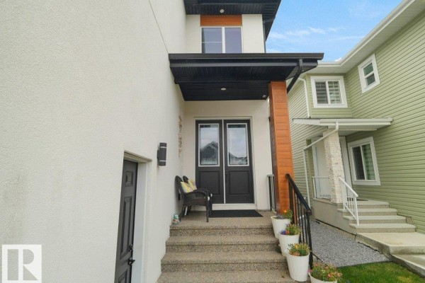 Family room - 1107 150 Av Nw, Edmonton, AB T5Y4C1 Photo 4
