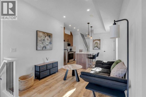 Living room - 111, 156 Park Street, Cochrane, AB T4C3H3 Photo 4