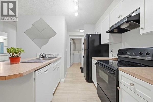 Dining room - 111, 5555 Falsbridge Drive Ne, Calgary, AB T3J3E8 Photo 3