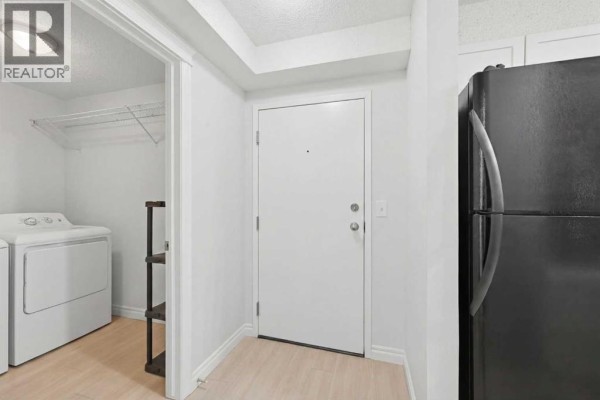 Laundry room - 111, 5555 Falsbridge Drive Ne, Calgary, AB T3J3E8 Photo 5