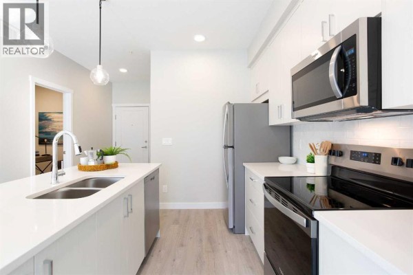 Laundry room - 111, 660 Shawnee Square, Calgary, AB T2Y0X6 Photo 5