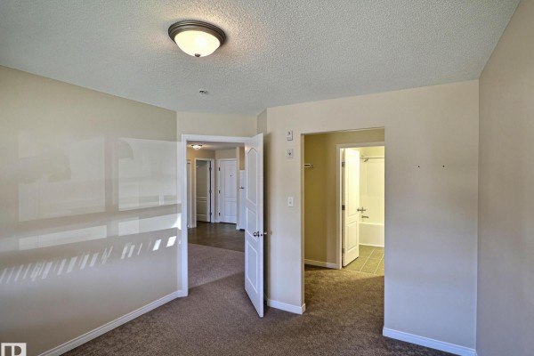 Bedroom 2 - #111 5350 199 St Nw, Edmonton, AB T6M0A4 Photo 5