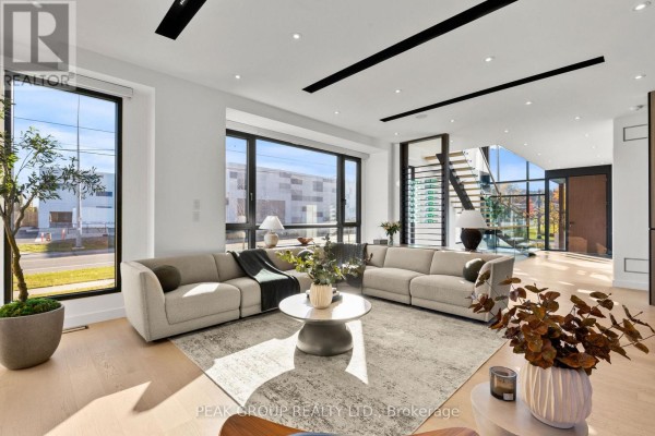 Modern home with large windows and two-car garage - 111 Millpond Road Niagara On The Lake