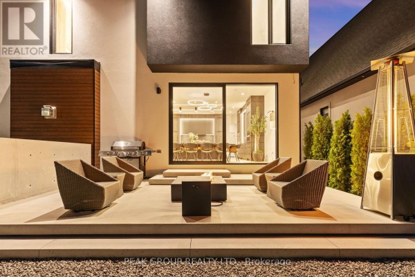 Modern hallway with built-in storage and bench seating - 111 Millpond Road Niagara On The Lake