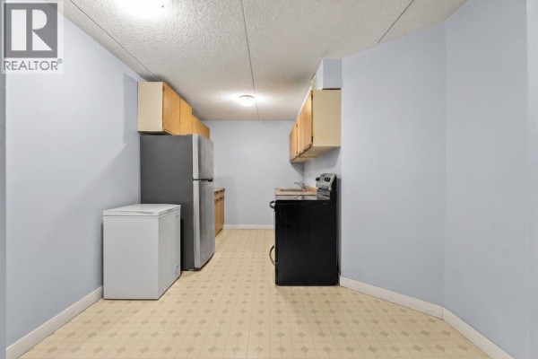 Bedroom - 1110, 5204 Dalton Drive Nw, Calgary, AB T3A3H1 Photo 2