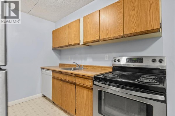 Dining room - 1110, 5204 Dalton Drive Nw, Calgary, AB T3A3H1 Photo 3