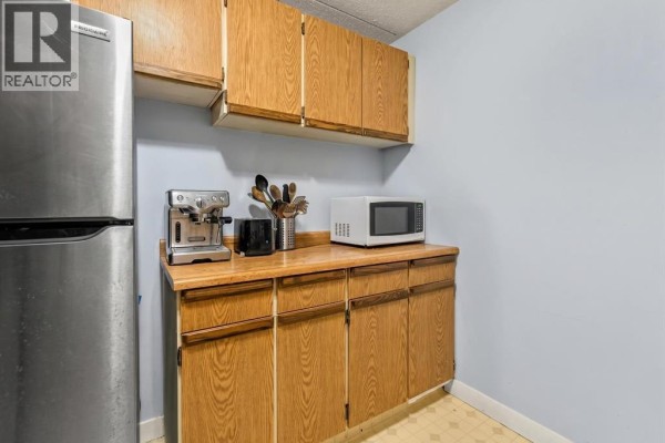 Kitchen - 1110, 5204 Dalton Drive Nw, Calgary, AB T3A3H1 Photo 4