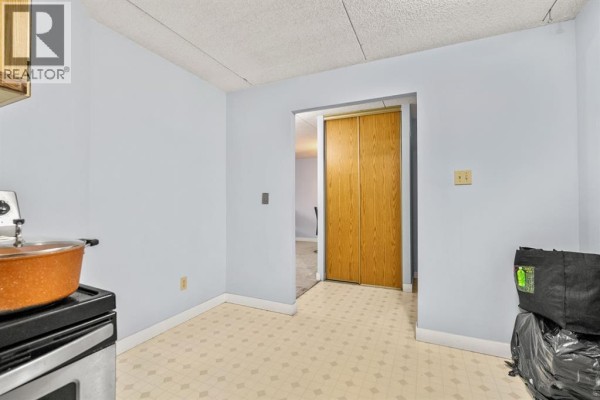 Living room - 1110, 5204 Dalton Drive Nw, Calgary, AB T3A3H1 Photo 5