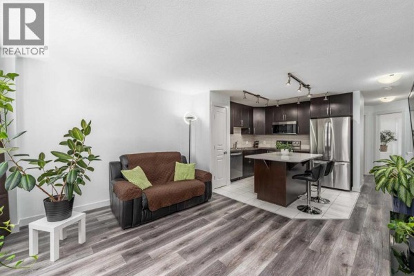 Living room - 1110 Mckenzie Towne Row Se, Calgary, AB T2Z1E1 Photo 4