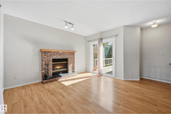 Family room - 11102 11a Av Nw, Edmonton, AB T6J6R9 Photo 4