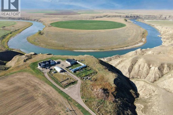 Aerial view of a property on a bluff overlooking a winding river and cultivated fields. - 111072 Rr#151, Purple Springs