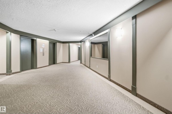 Primary Bedroom - #1115 13910 Stony Plain Rd Nw, Edmonton, AB T5N3R2 Photo 4