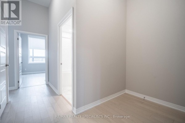 Bedroom 2 - 112 - 3265 Carding Mill Trail, Oakville, ON L6M5P7 Photo 4