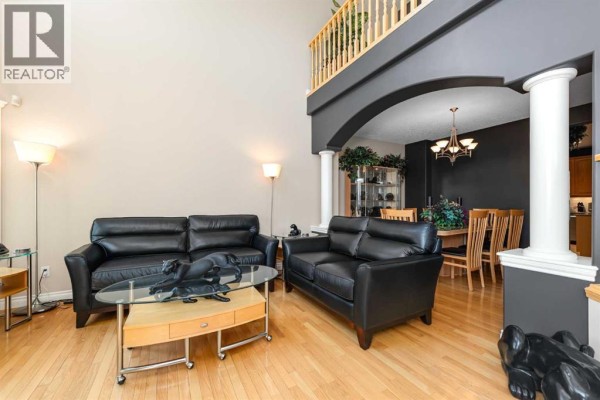 Family room - 112 Cove Crescent, Chestermere, AB T1X1J5 Photo 4