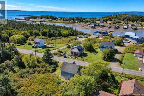 Family room - 112 White Head Road, White Head Island, NB E5G1K4 Photo 3