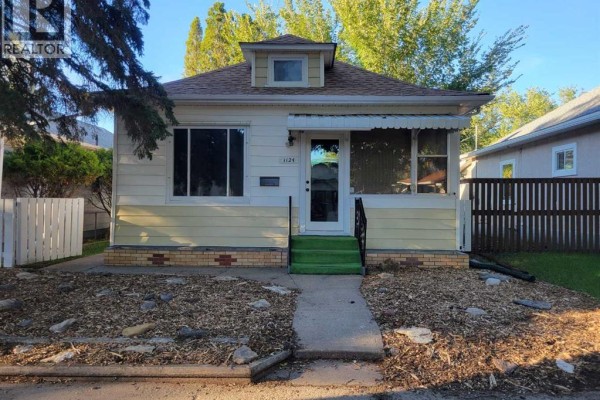 Living room - 1124 Balmoral Street Se, Medicine Hat, AB T1A0X6 Photo 2