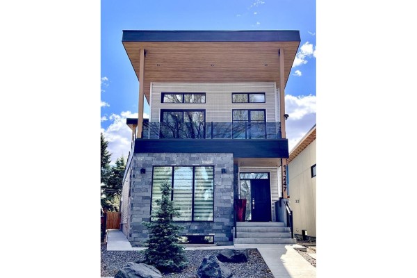 Dining area with glass table, upholstered chairs, and large horizontal blinds. - 11247 71 Av Nw, Edmonton
