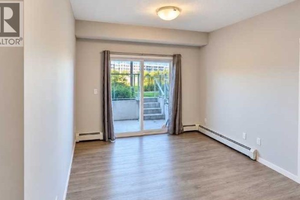 Primary Bedroom - 113, 4150 Seton Drive Se, Calgary, AB T3M2C7 Photo 4