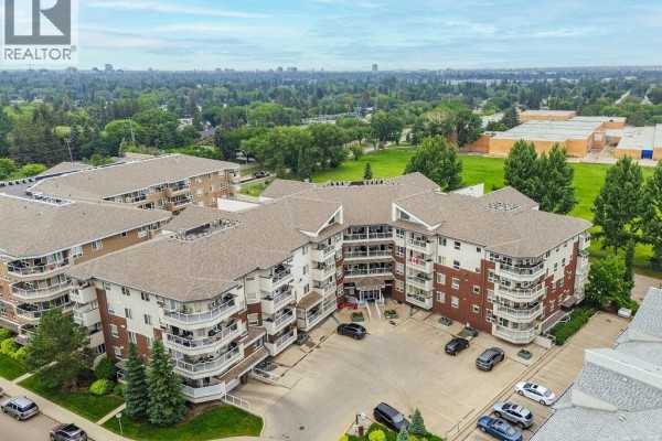 Aerial view of the apartment building complex and surrounding neighborhood. - 113 106 Armistice Way, Saskatoon