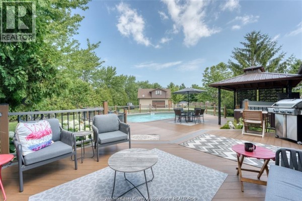 Deck with pool, gazebo, grill, and seating - 113 Beach Court Stoney Point