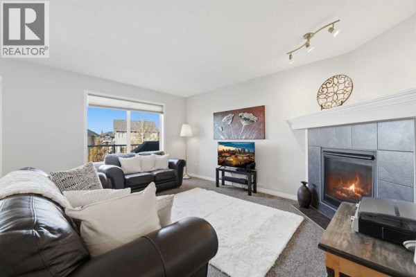 Living room - 113 Drake Landing Heath, Okotoks, AB T1S0G8 Photo 5